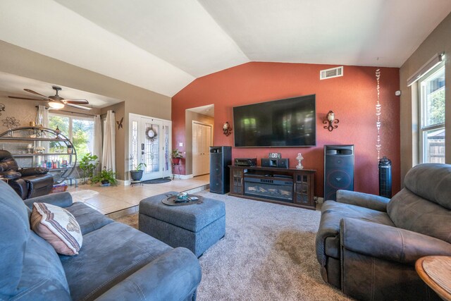 1136 Woodland Ter, Redding, CA 96002 - living area featuring lofted ceiling, a ceiling fan, and healthy amount of natural light