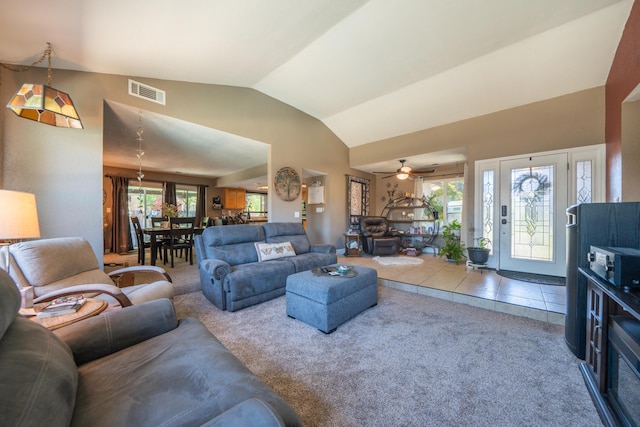 1136 Woodland Ter, Redding, CA 96002 - carpeted living room with vaulted ceiling, healthy amount of natural light, and a ceiling fan