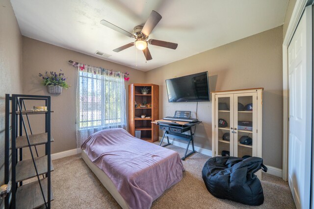 1136 Woodland Ter, Redding, CA 96002 - carpeted bedroom with baseboards and ceiling fan