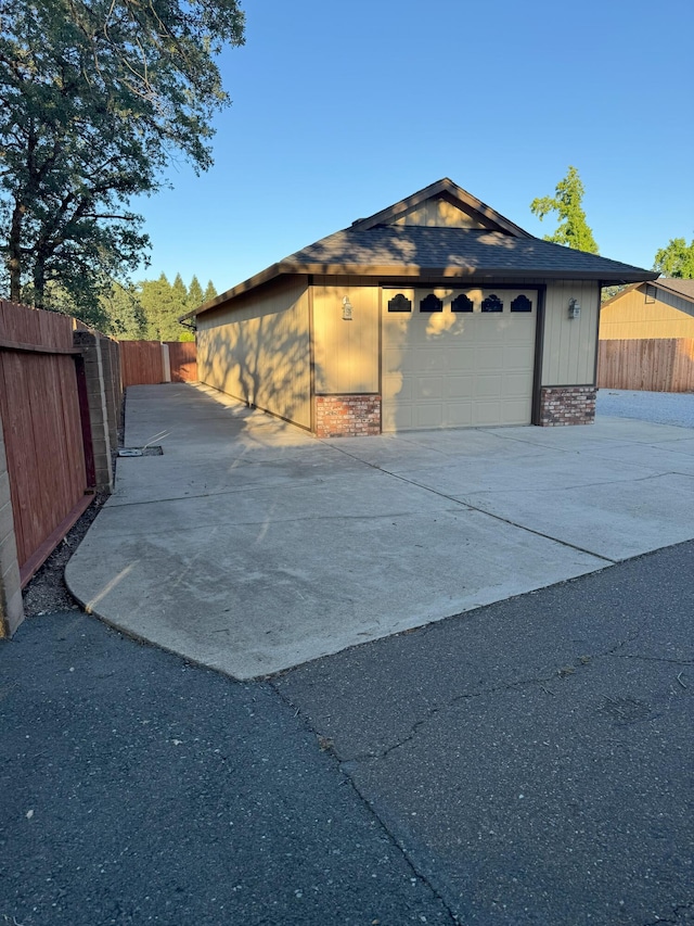 1407 Fayette Ln, Redding, CA 96003 - detached garage featuring concrete driveway