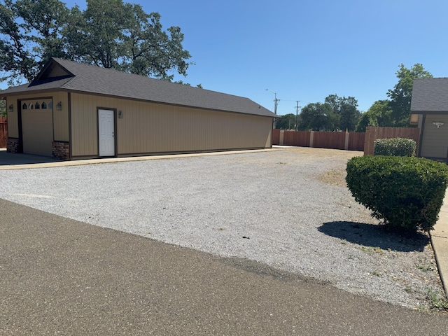 1407 Fayette Ln, Redding, CA 96003 - view of side of home with a garage