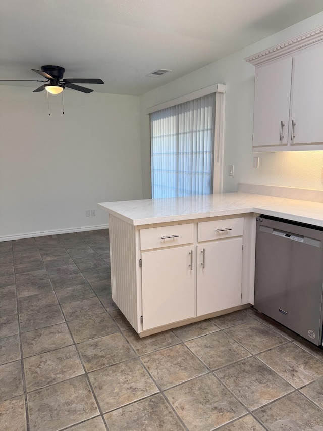 1407 Fayette Ln, Redding, CA 96003 - kitchen with stainless steel dishwasher, a peninsula, a ceiling fan, and white cabinetry