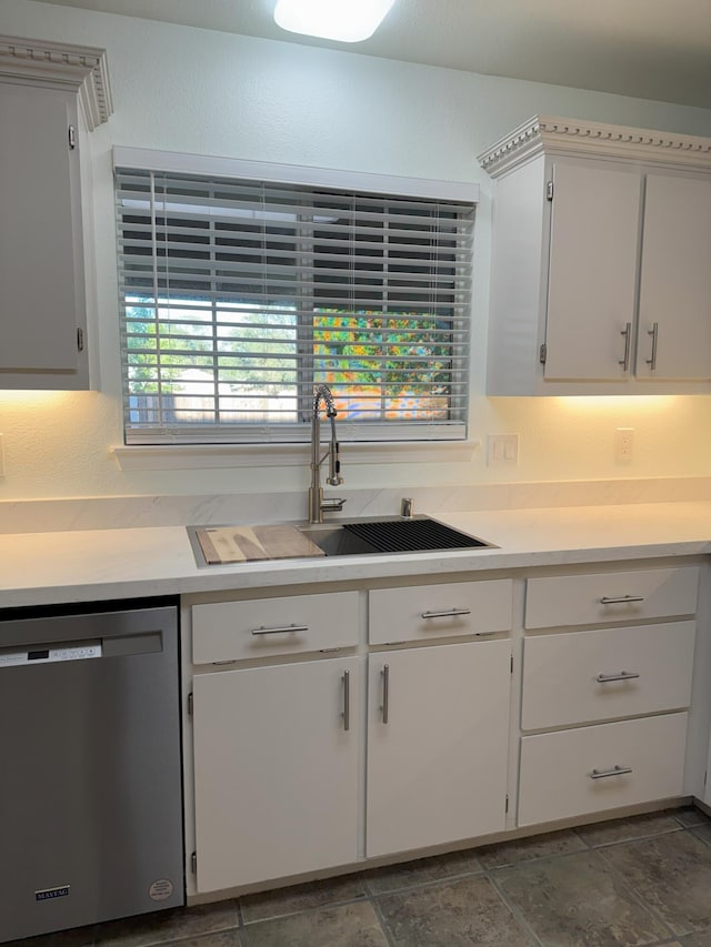 1407 Fayette Ln, Redding, CA 96003 - kitchen featuring dishwasher, a sink, light countertops, and white cabinetry