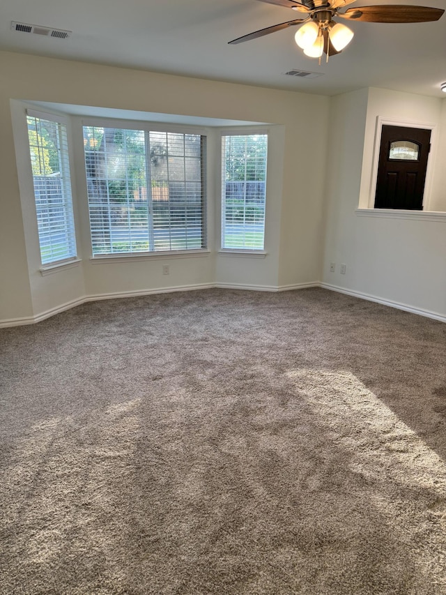 1407 Fayette Ln, Redding, CA 96003 - carpeted spare room with ceiling fan, healthy amount of natural light, and baseboards