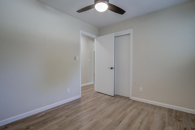 3090 Inez St, Redding, CA 96002 - empty room featuring wood finished floors, a ceiling fan, and baseboards