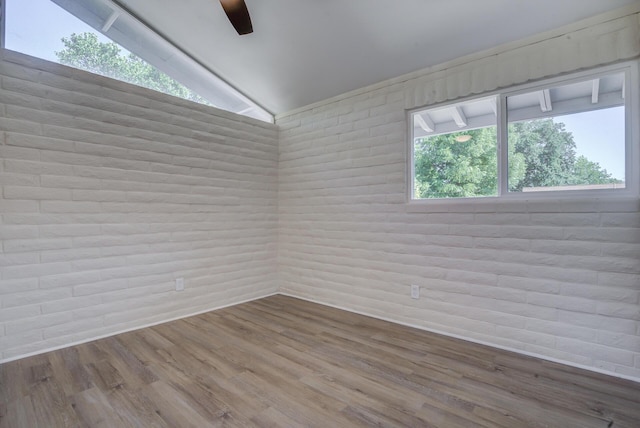 3090 Inez St, Redding, CA 96002 - spare room with ceiling fan, vaulted ceiling, and wood finished floors