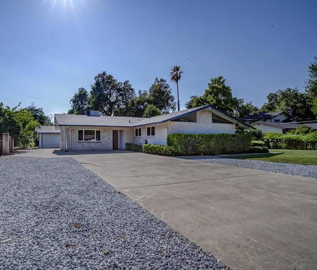 3090 Inez St, Redding, CA 96002 - ranch-style house with brick siding and concrete driveway