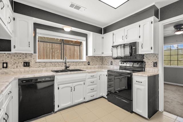 2420 Ostling Ave, Shasta Lake, CA 96019 - kitchen featuring black appliances, a ceiling fan, white cabinetry, and backsplash