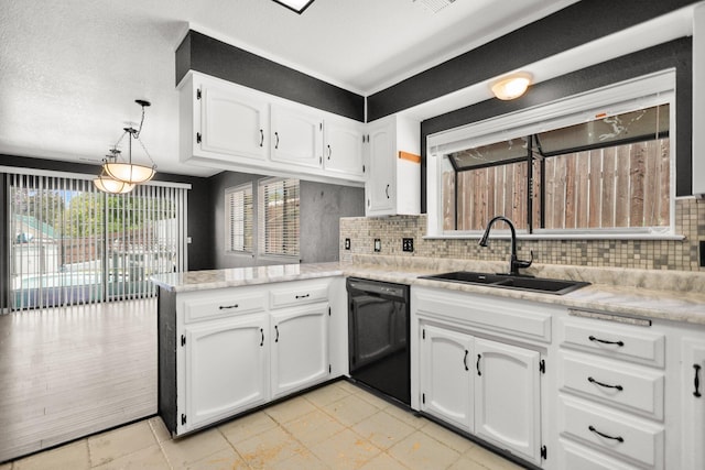 2420 Ostling Ave, Shasta Lake, CA 96019 - kitchen featuring black dishwasher, a peninsula, white cabinets, and light countertops