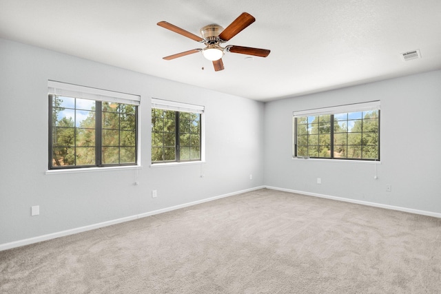 2420 Ostling Ave, Shasta Lake, CA 96019 - carpeted spare room featuring plenty of natural light and ceiling fan