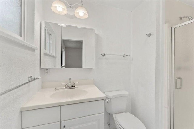 4200 Travona St, Redding, CA 96001 - full bathroom featuring vanity, a stall shower, and toilet