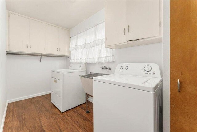 4200 Travona St, Redding, CA 96001 - laundry room with cabinet space, wood finished floors, washer and dryer, and baseboards