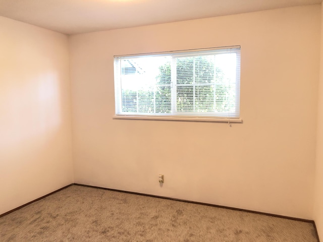 4200 Travona St, Redding, CA 96001 - unfurnished room featuring light carpet and baseboards