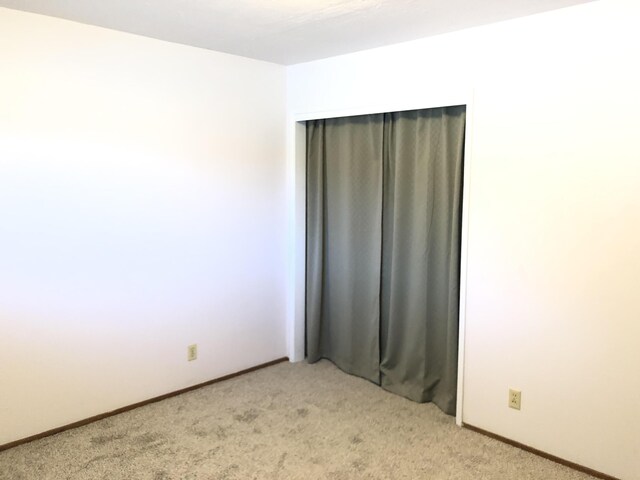 4200 Travona St, Redding, CA 96001 - unfurnished bedroom featuring light carpet and baseboards