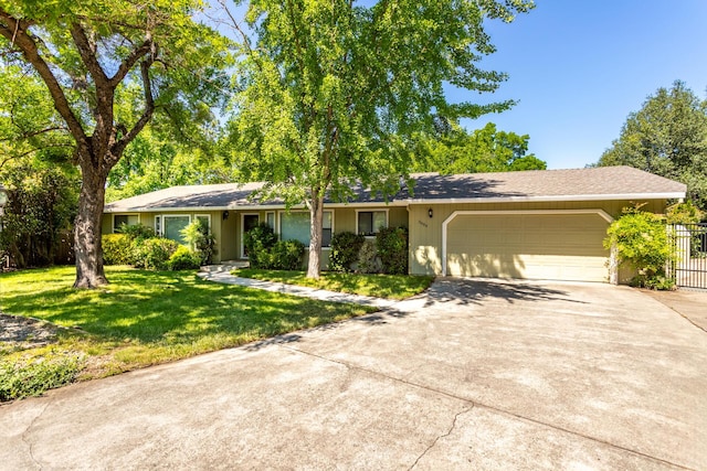 3484 Bello Ct, Redding, CA 96002 - ranch-style house with a garage and driveway