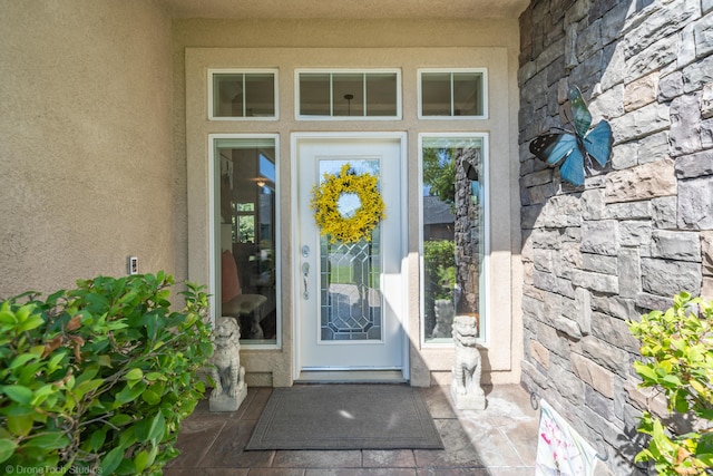 3179 Pinot Path, Redding, CA 96001 - view of exterior entry with stucco siding and stone siding