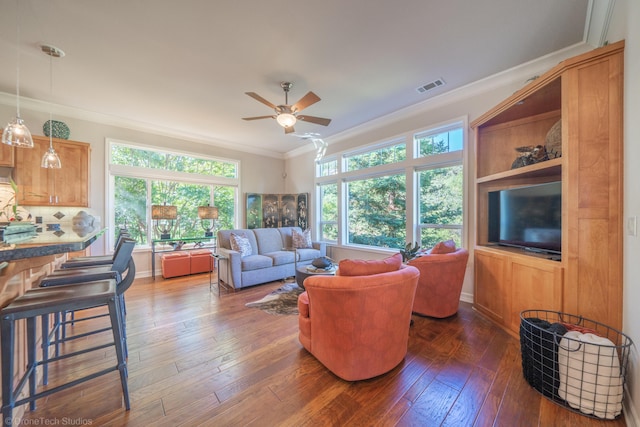 3179 Pinot Path, Redding, CA 96001 - living room featuring crown molding, ceiling fan, and dark wood finished floors