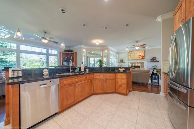 3179 Pinot Path, Redding, CA 96001 - kitchen featuring stainless steel appliances, a ceiling fan, open floor plan, a sink, and ornamental molding