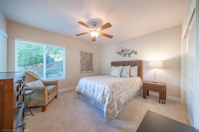 3179 Pinot Path, Redding, CA 96001 - carpeted bedroom with a closet, baseboards, and ceiling fan