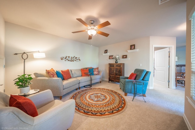 3179 Pinot Path, Redding, CA 96001 - living room featuring a ceiling fan, carpet, and baseboards