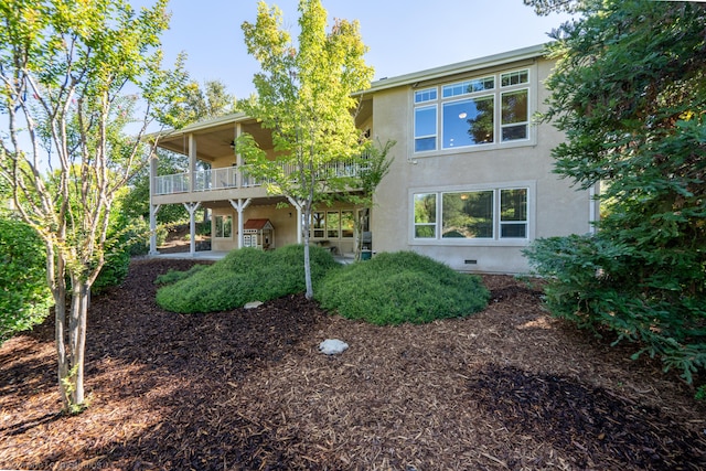 3179 Pinot Path, Redding, CA 96001 - back of house with a balcony, stucco siding, a ceiling fan, and crawl space