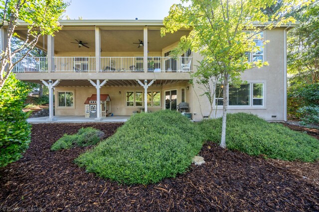3179 Pinot Path, Redding, CA 96001 - back of house featuring ceiling fan, stucco siding, a patio, and a balcony