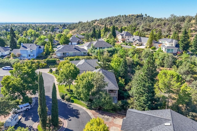 3179 Pinot Path, Redding, CA 96001 - aerial perspective of suburban area with a heavily wooded area