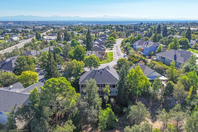 3179 Pinot Path, Redding, CA 96001 - aerial view of property's location with nearby suburban area and a mountainous background
