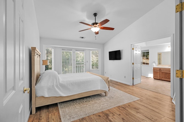 21247 Creekside Dr, Red Bluff, CA 96080 - bedroom featuring lofted ceiling, access to exterior, light wood finished floors, baseboards, and a ceiling fan