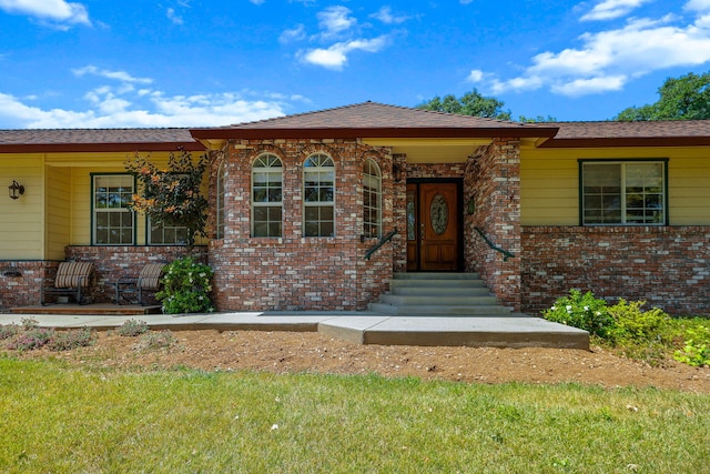 21247 Creekside Dr, Red Bluff, CA 96080 - view of front of house with brick siding and a front yard