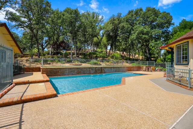 21247 Creekside Dr, Red Bluff, CA 96080 - view of pool featuring a patio and a fenced backyard