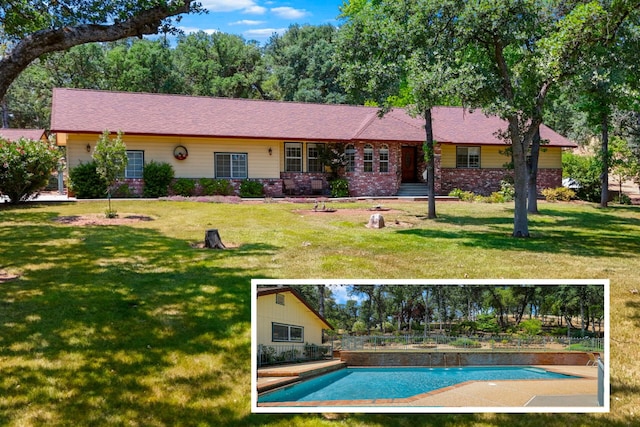 21247 Creekside Dr, Red Bluff, CA 96080 - view of front of property with a front yard and an outdoor pool