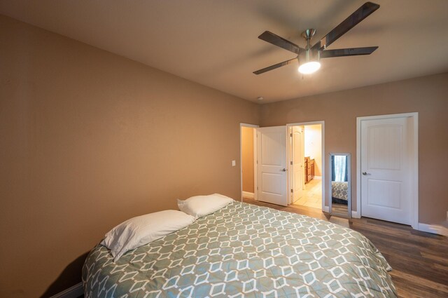 13787 Walter Ave, Redding, CA 96003 - bedroom with dark wood-style flooring, baseboards, and a ceiling fan