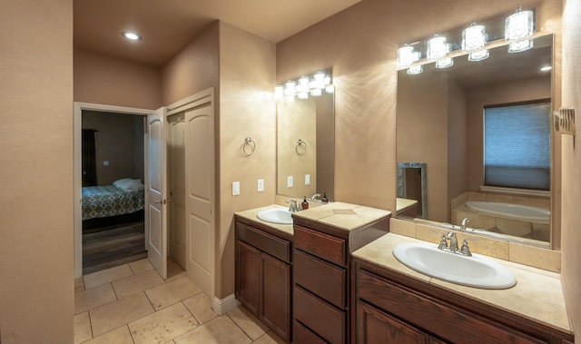 13787 Walter Ave, Redding, CA 96003 - full bath with double vanity, tile patterned floors, a garden tub, and ensuite bathroom