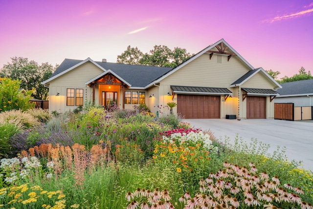 180 Agua Verdi Dr, Red Bluff, CA 96080 - view of front of property with board and batten siding, a garage, and concrete driveway