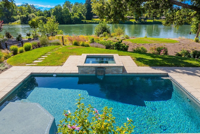 180 Agua Verdi Dr, Red Bluff, CA 96080 - outdoor pool featuring an in-ground hot tub, a water view, and a yard
