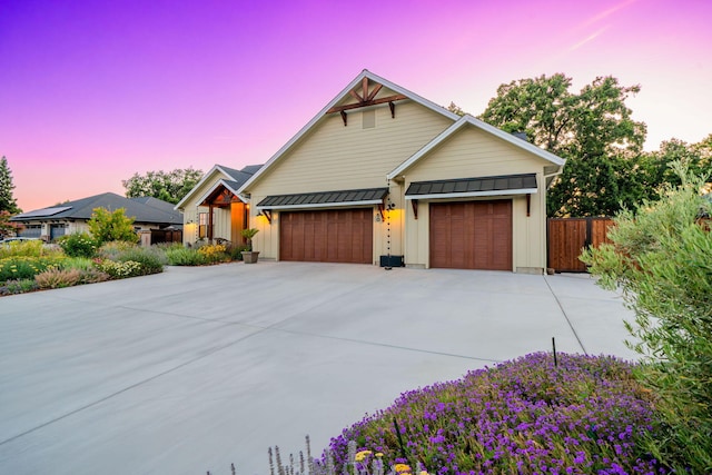 180 Agua Verdi Dr, Red Bluff, CA 96080 - view of front of property featuring board and batten siding, concrete driveway, and an attached garage