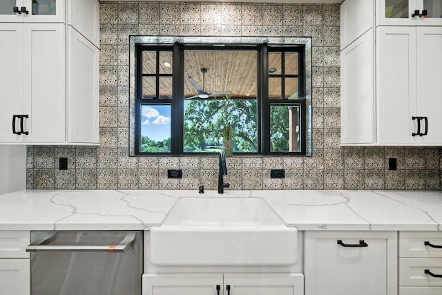 180 Agua Verdi Dr, Red Bluff, CA 96080 - kitchen with stainless steel dishwasher, white cabinets, tasteful backsplash, and glass insert cabinets