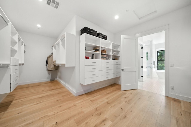 180 Agua Verdi Dr, Red Bluff, CA 96080 - spacious closet featuring attic access and light wood-style flooring