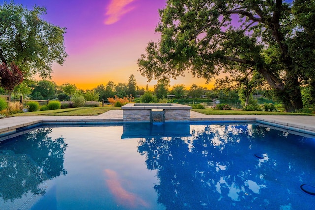 180 Agua Verdi Dr, Red Bluff, CA 96080 - pool at dusk featuring an outdoor pool and an outdoor hot tub