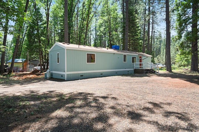 7530 Brett Rd, Shingletown, CA 96088 - rear view of property with crawl space