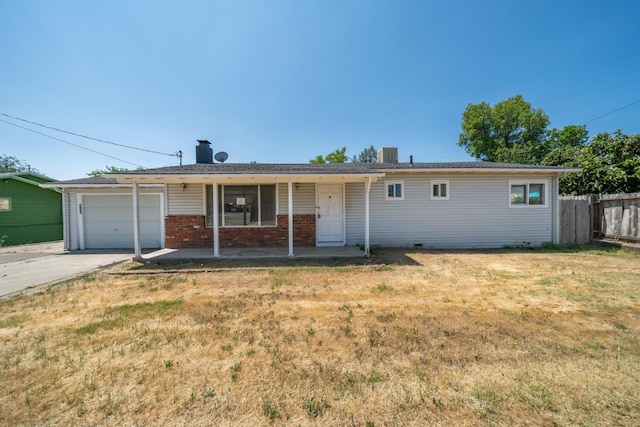 852 Lake Blvd, Redding, CA 96003 - ranch-style home featuring brick siding, a garage, and concrete driveway
