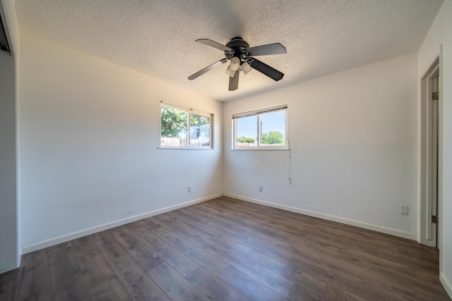 852 Lake Blvd, Redding, CA 96003 - empty room with a ceiling fan, a textured ceiling, dark wood-style floors, and baseboards