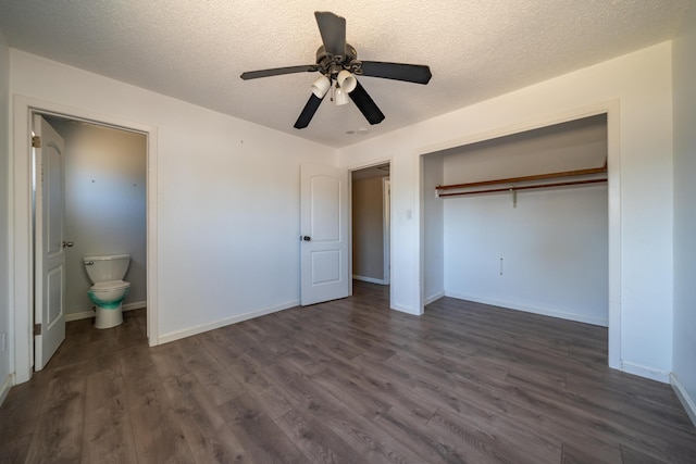 852 Lake Blvd, Redding, CA 96003 - unfurnished bedroom featuring dark wood-style flooring, a textured ceiling, a closet, baseboards, and ceiling fan