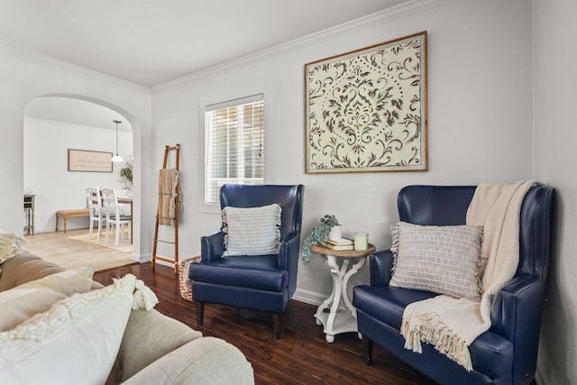 1545 Olive Ave, Redding, CA 96001 - living room featuring crown molding, arched walkways, and wood finished floors