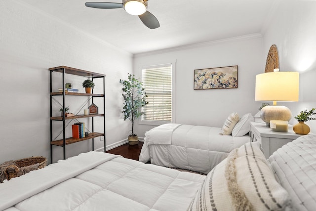 1545 Olive Ave, Redding, CA 96001 - bedroom with dark wood-type flooring, crown molding, and ceiling fan
