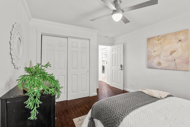 1545 Olive Ave, Redding, CA 96001 - bedroom with hardwood / wood-style floors, ornamental molding, a closet, and a ceiling fan