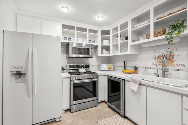 1545 Olive Ave, Redding, CA 96001 - kitchen with stainless steel appliances, beverage cooler, open shelves, and light countertops