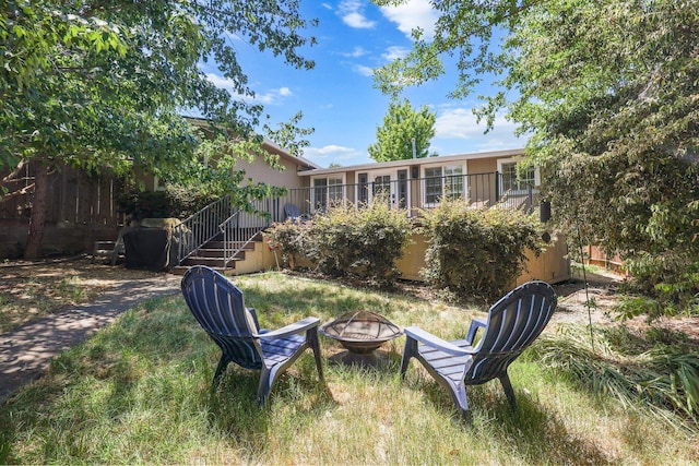 1545 Olive Ave, Redding, CA 96001 - view of yard with a fire pit and stairs