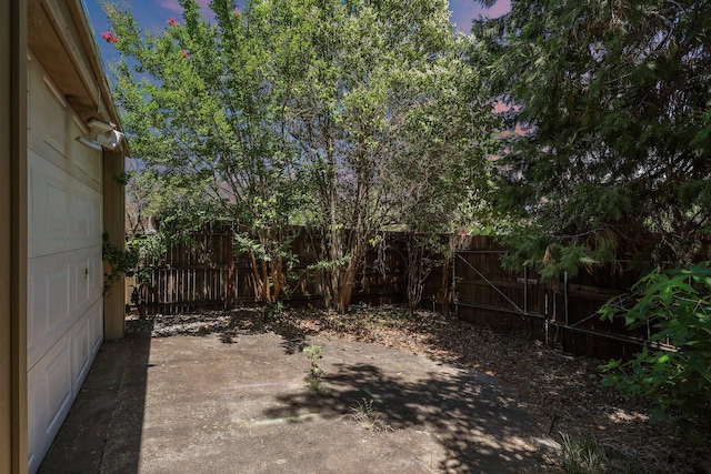 1545 Olive Ave, Redding, CA 96001 - fenced backyard featuring a patio